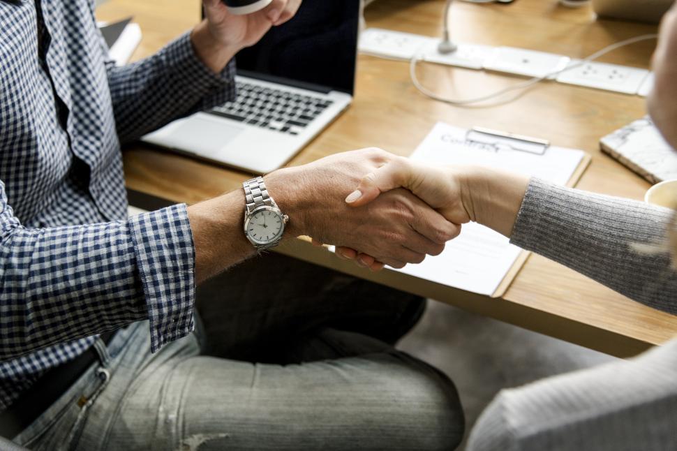 Free Image of Greeting handshake between two business people 