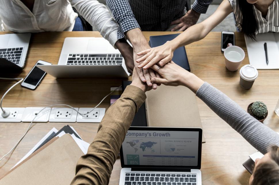 Free Image of Hands stacked together, office solidarity 