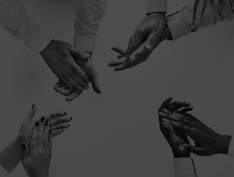 Free Image of Over the head shaded view of hands clapping 