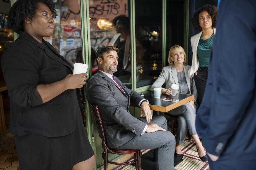 Free Image of Multiethnicity colleagues outside a cafe 