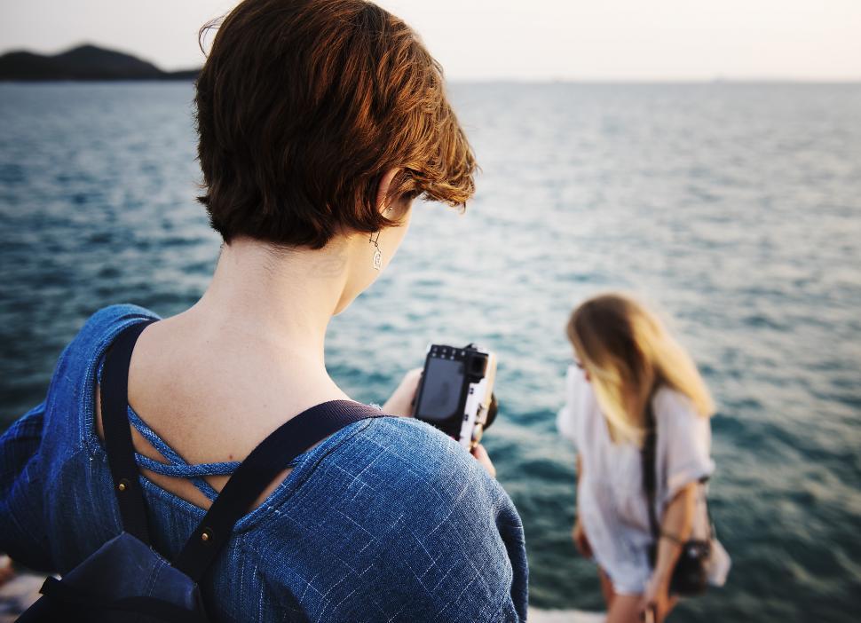 Free Image of Two young caucasian women by the sea 