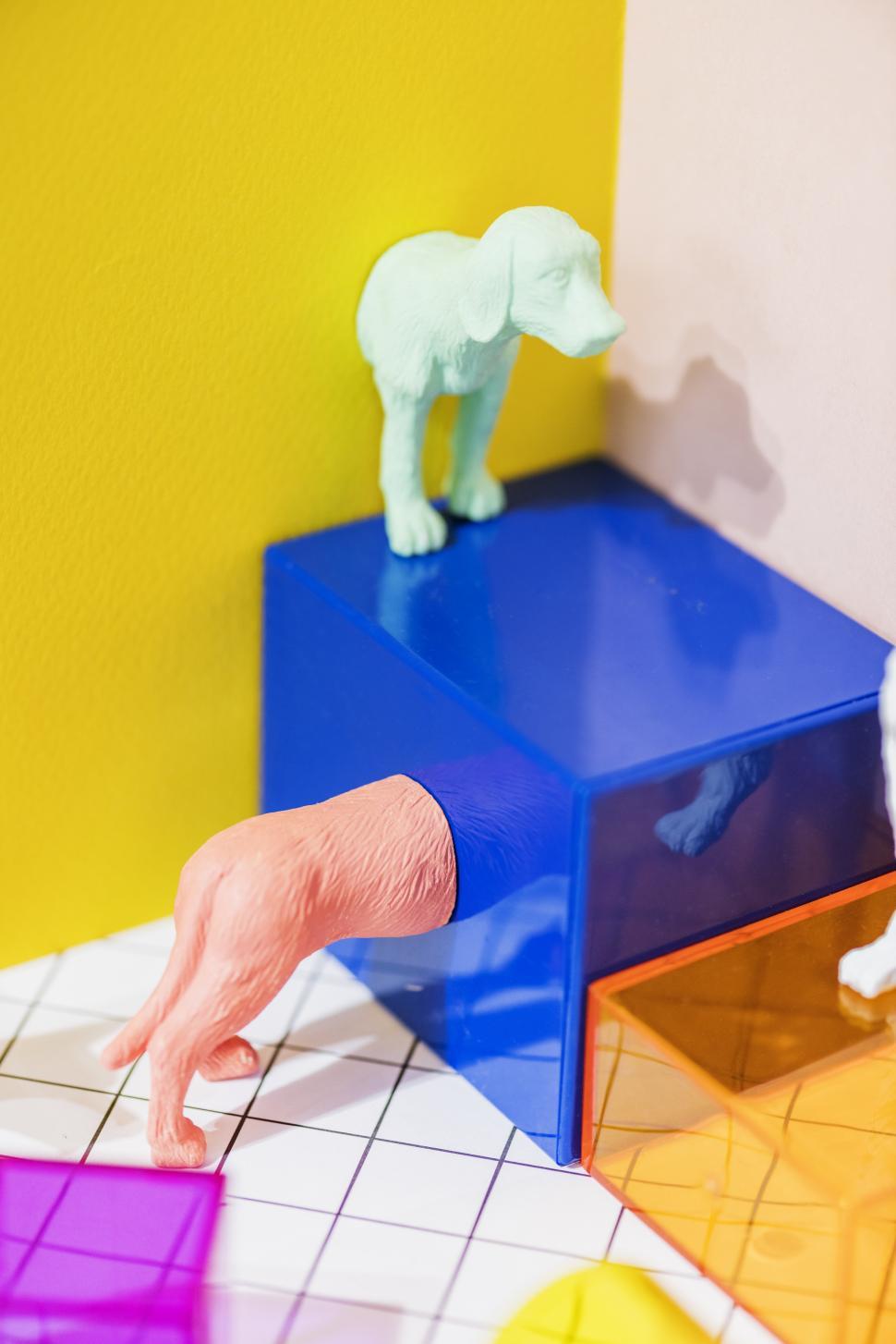 Free Image of Colorful toy animals with geometric glass figures 