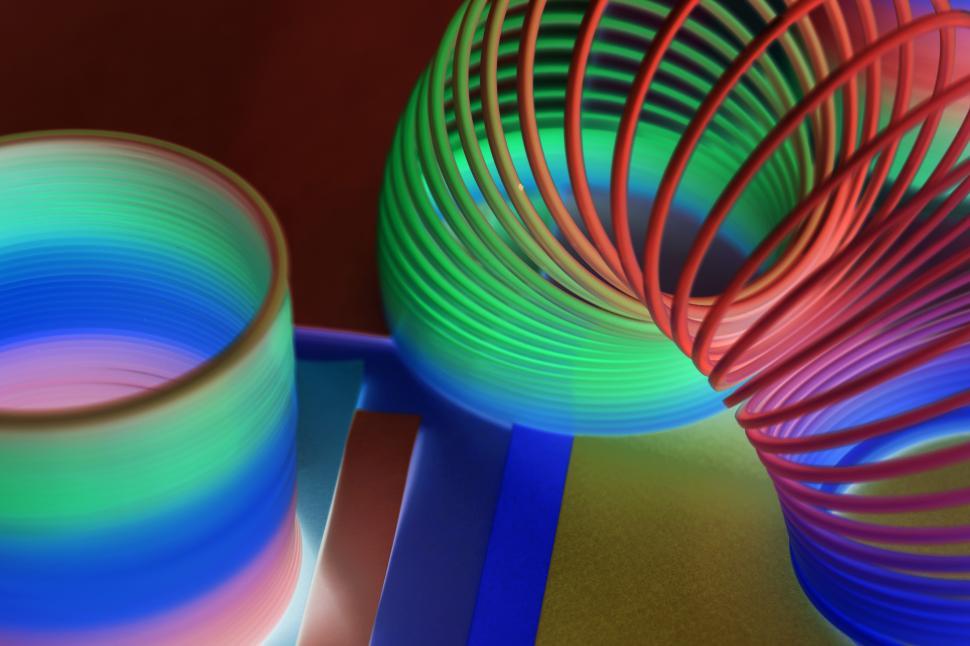 Free Image of Inverted color close up of colorful slinky 