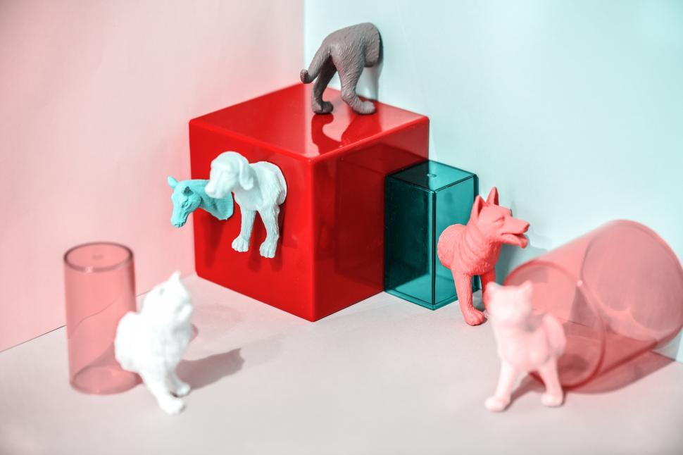 Free Image of Colorful toy animals with geometric glass figures 