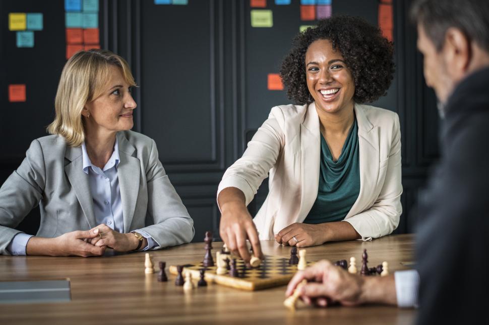 Free Image of Three business people playing chess 