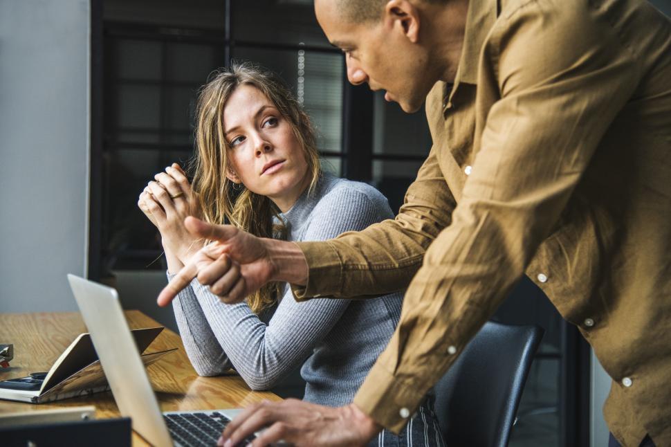 Free Image of Woman watching colleague in the office 