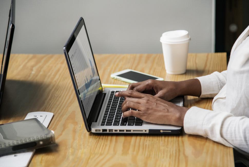 Free Image of Close up of a hands typing on a laptop 