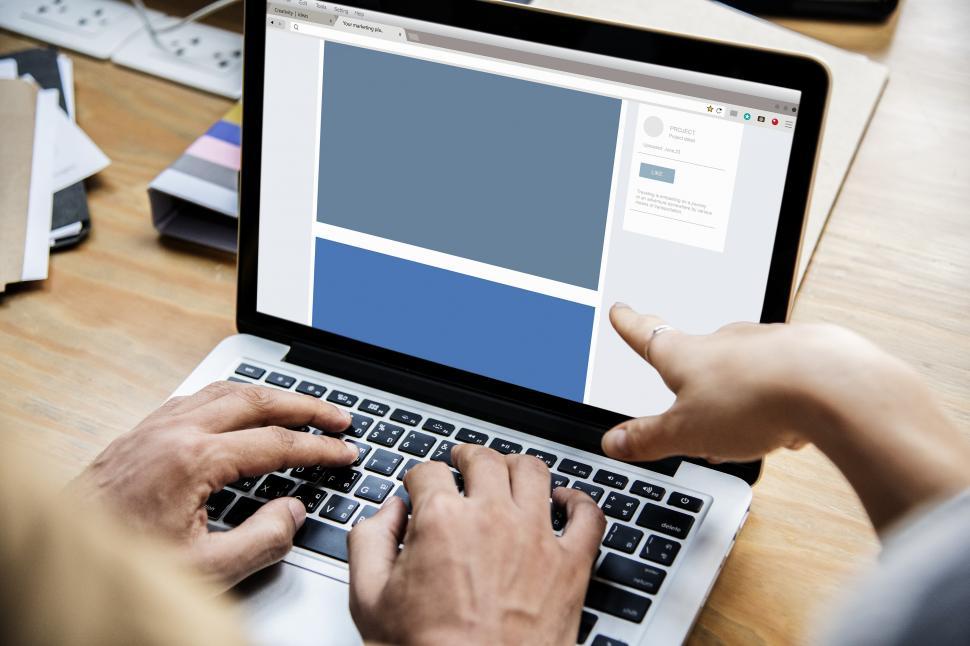 Free Image of Group of people pointing at the laptop 
