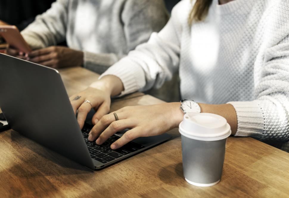 Free Image of Woman typing on a portable computer 