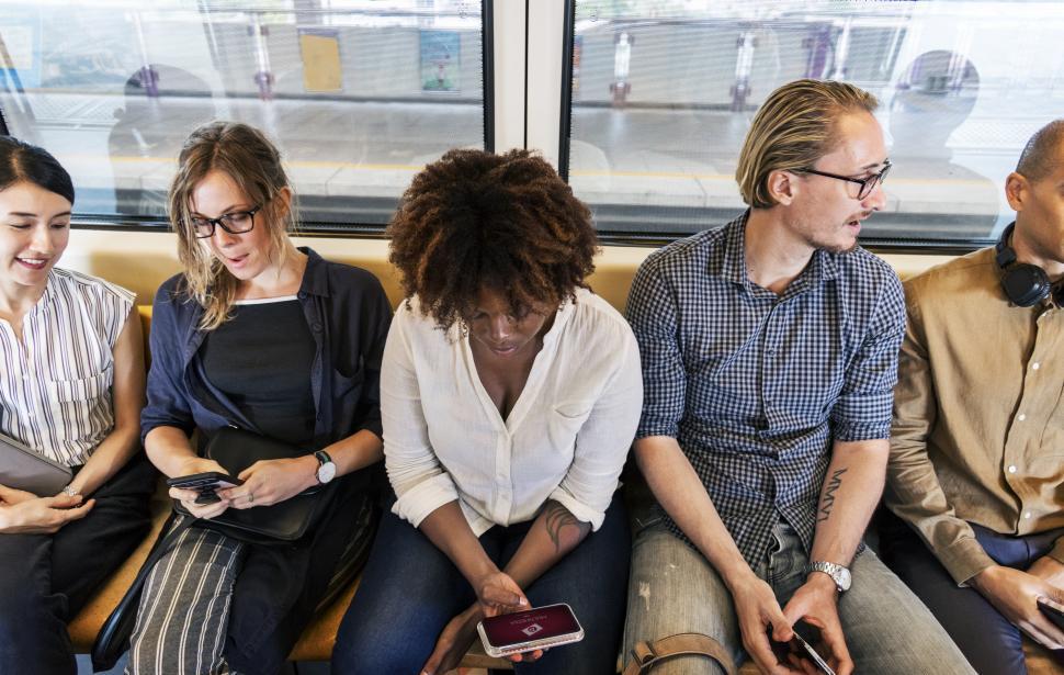 Free Image of A close up of commuters in a train, tight fit 