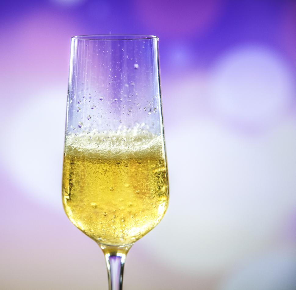 Free Image of Close up of a champagne glass on light background 