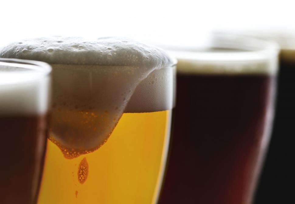 Free Image of Close up of overflowing beer foam 