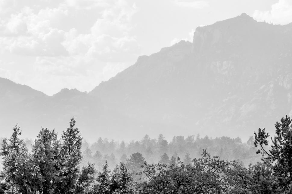 Free Image of Black and white valley and distant mountains 
