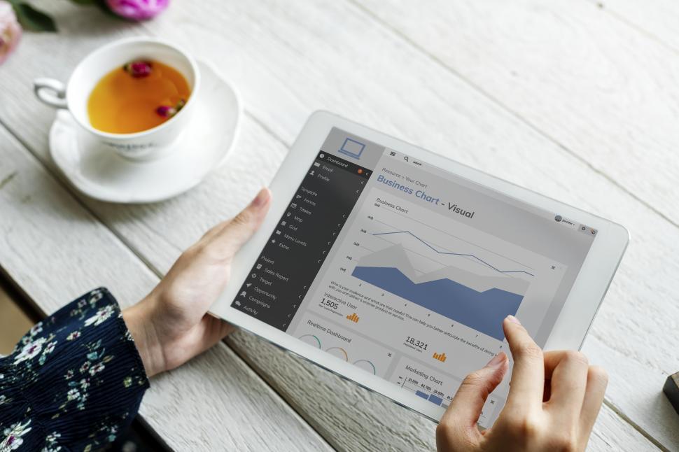 Free Image of Close up of a woman  holding a tablet PC 