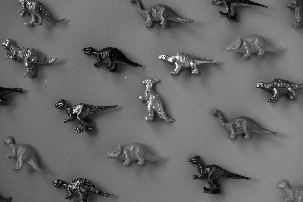 Free Image of Toy dinosaurs on flat surface 