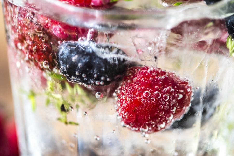 Free Image of Close up of chilled beverage with blueberry and raspberry 