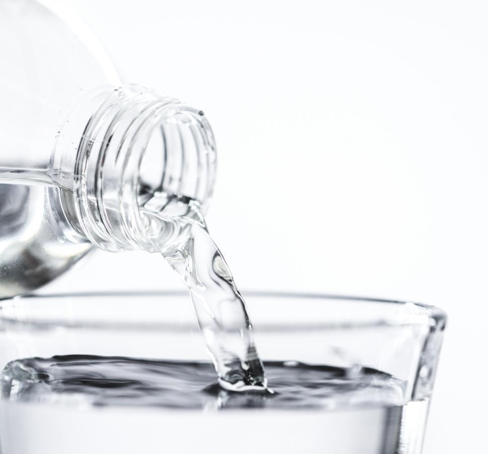 Free Image of water being poured into a glass 