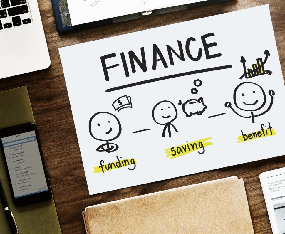 Free Image of Close up of a Finance illustrated poster on the table 