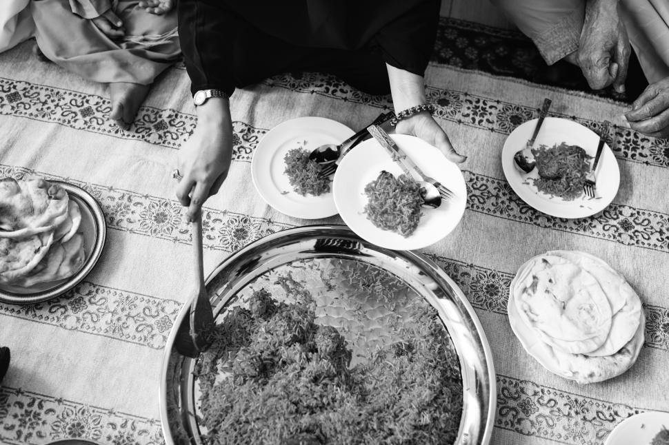 Free Image of Overhead view of Biryani being served 