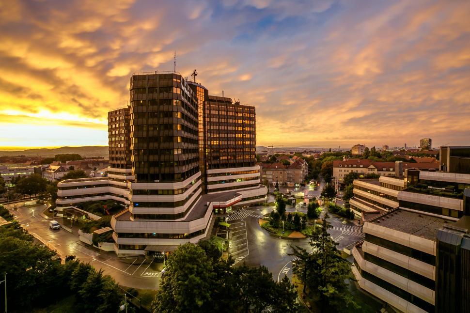 Free Image of A Sunset View of a City With Tall Buildings 