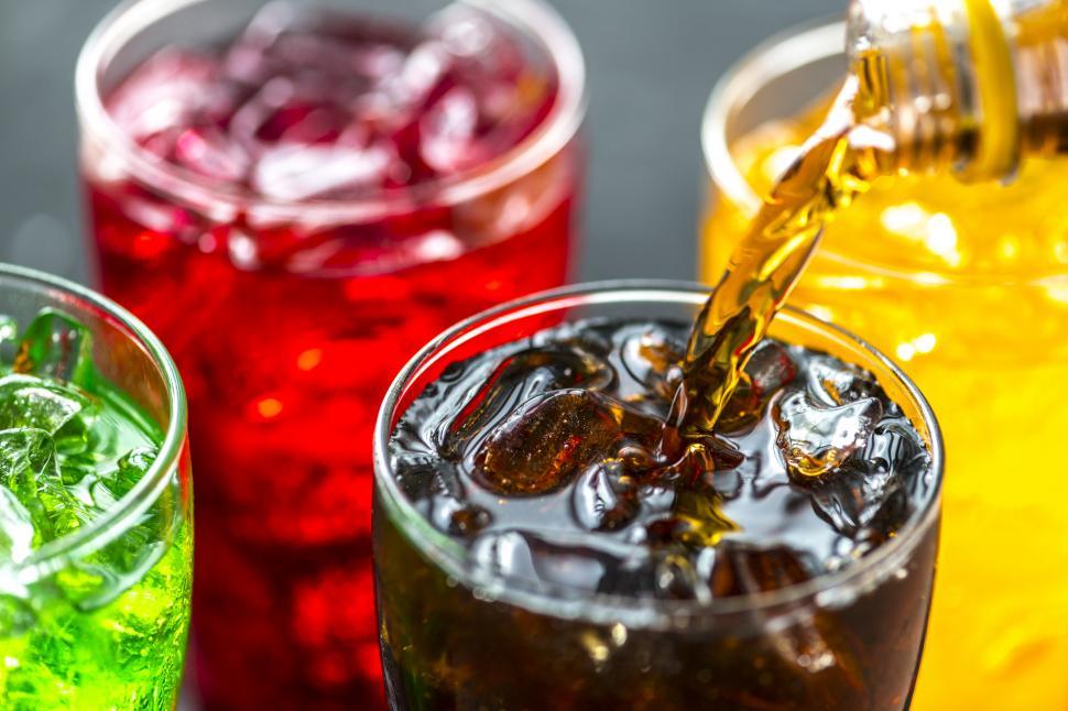 Free Image of Soft drink being poured into a pint glass 