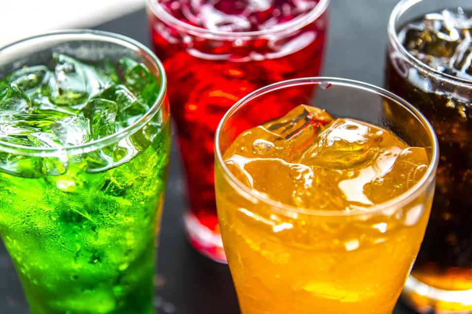Free Image of Colorful soft drinks in pint glasses 
