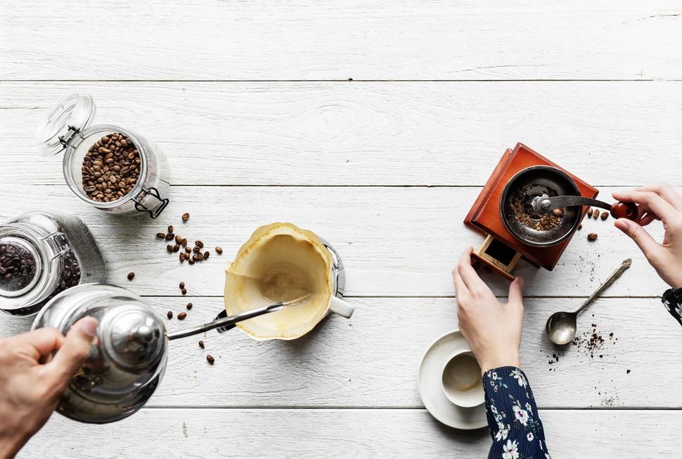 Free Image of Close up of hot water being poured over coffee filter cone - pourover 
