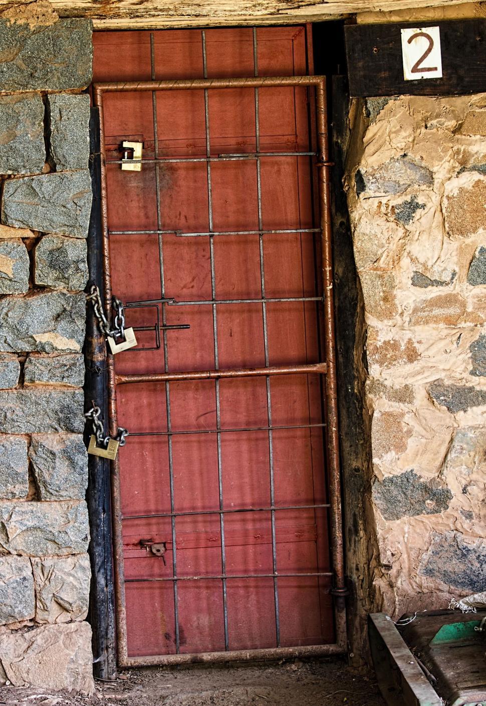Free Image of Stone Building Door With Number 