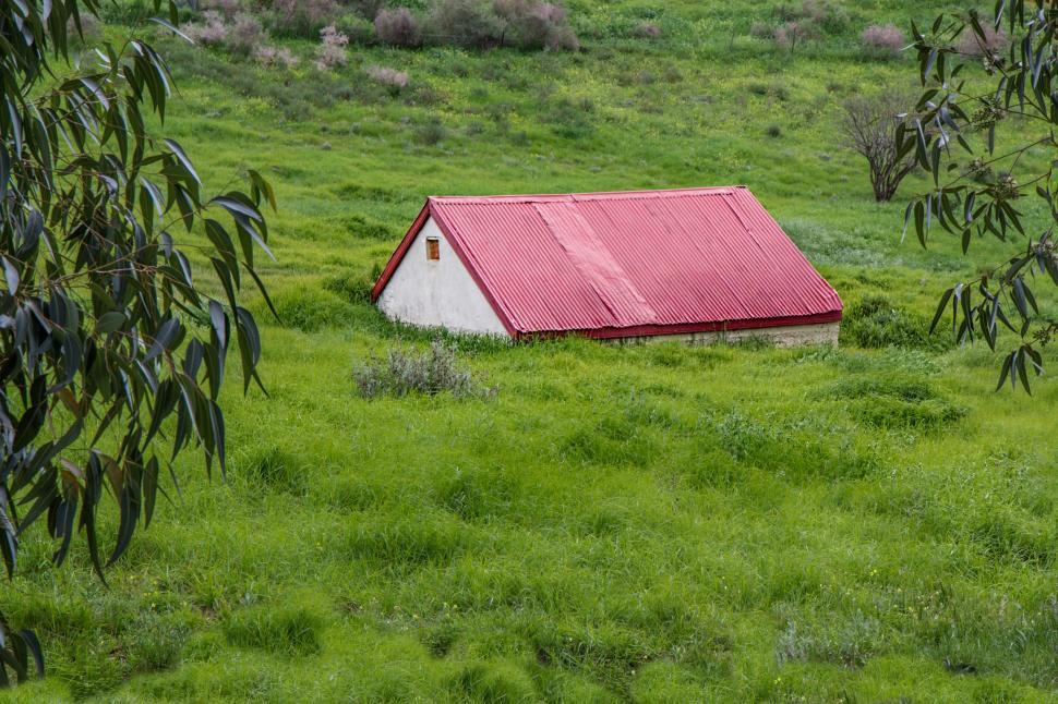 Free Image of Red and White House in Green Field 