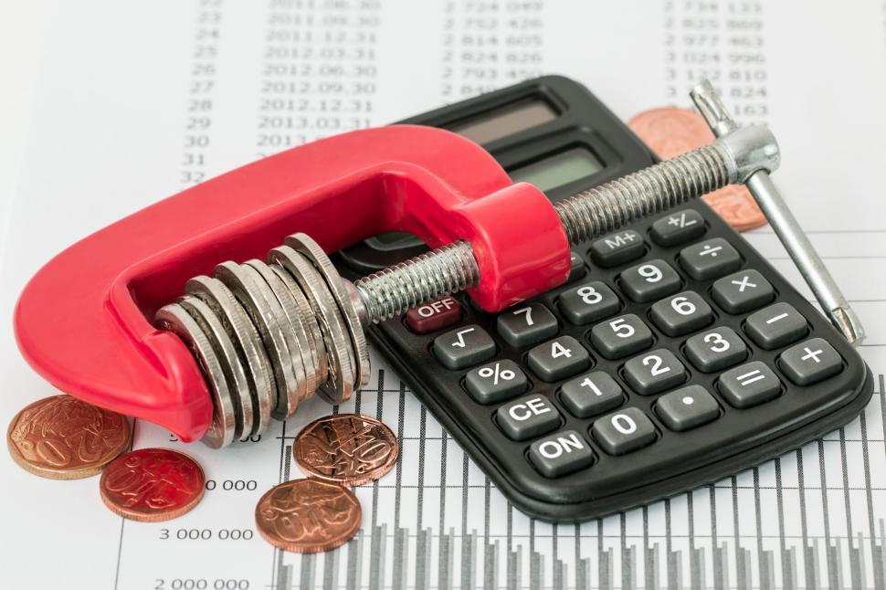 Free Image of Calculator and Calculator Sitting on Top of a Calculator 