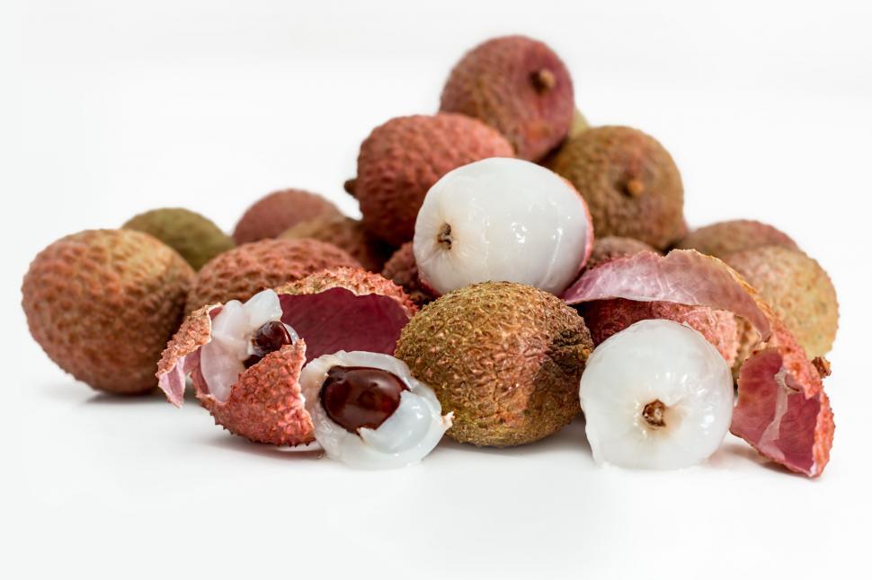 Free Image of Pile of Rotten Fruit on White Table 