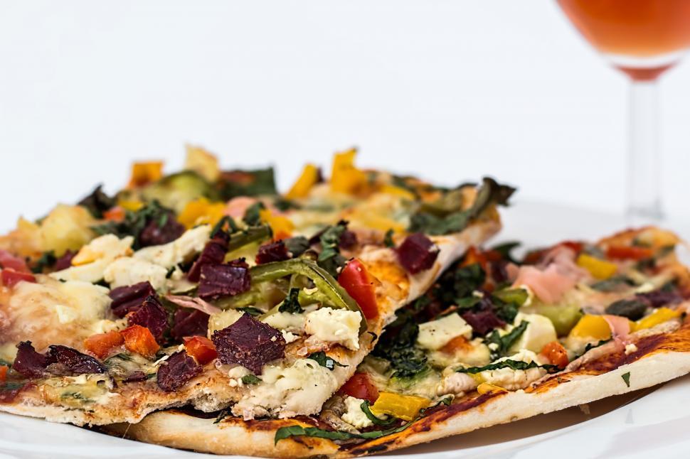 Free Image of White Plate With Pizza and Glass of Wine. 