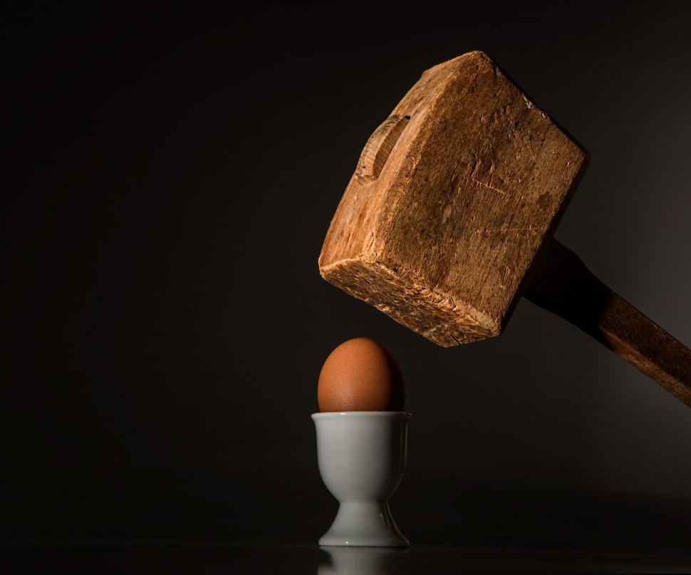 Free Image of Wooden Block of Wood Next to Egg in Cup 