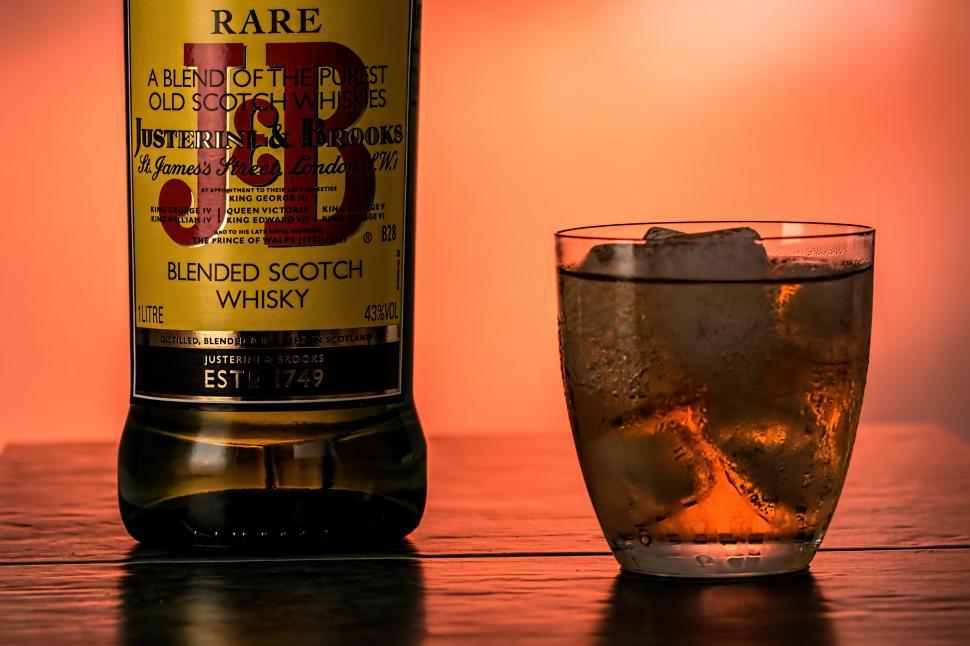 Free Image of Bottle of Booze and Glass of Ice 