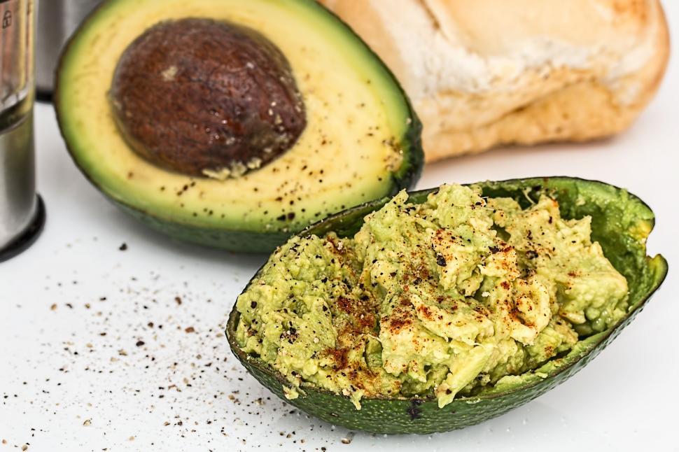 Free Image of Avocado and Bread on White Surface 
