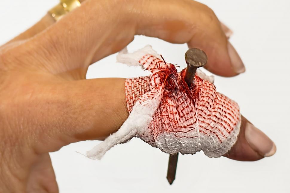 Free Image of Holding Small Piece of Fabric 