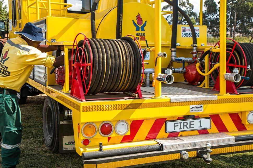 Free Image of Man Working on a Fire Truck 