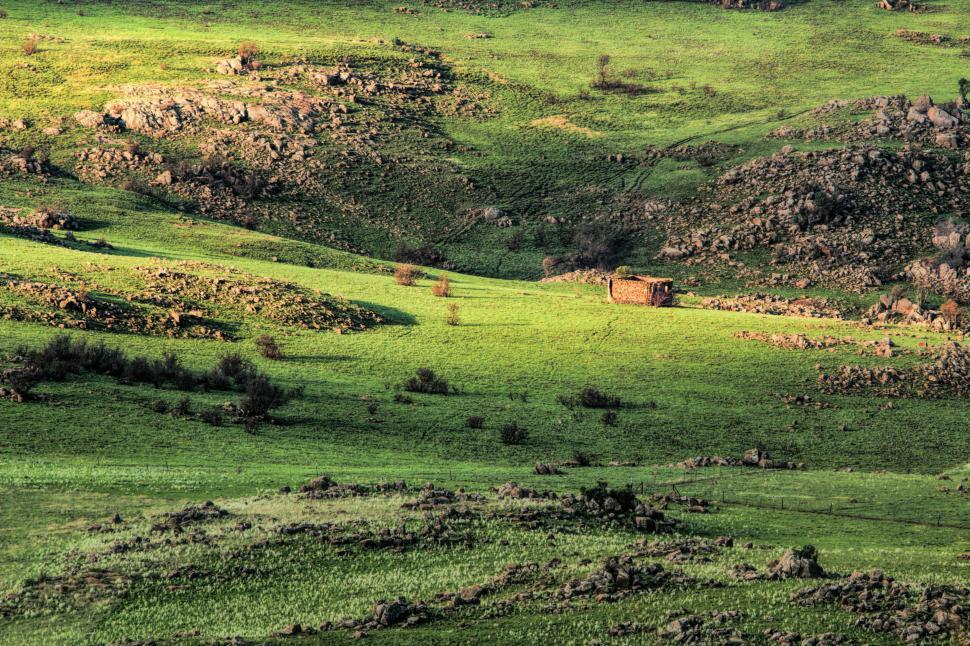 Free Image of Green Field With Small Hut 