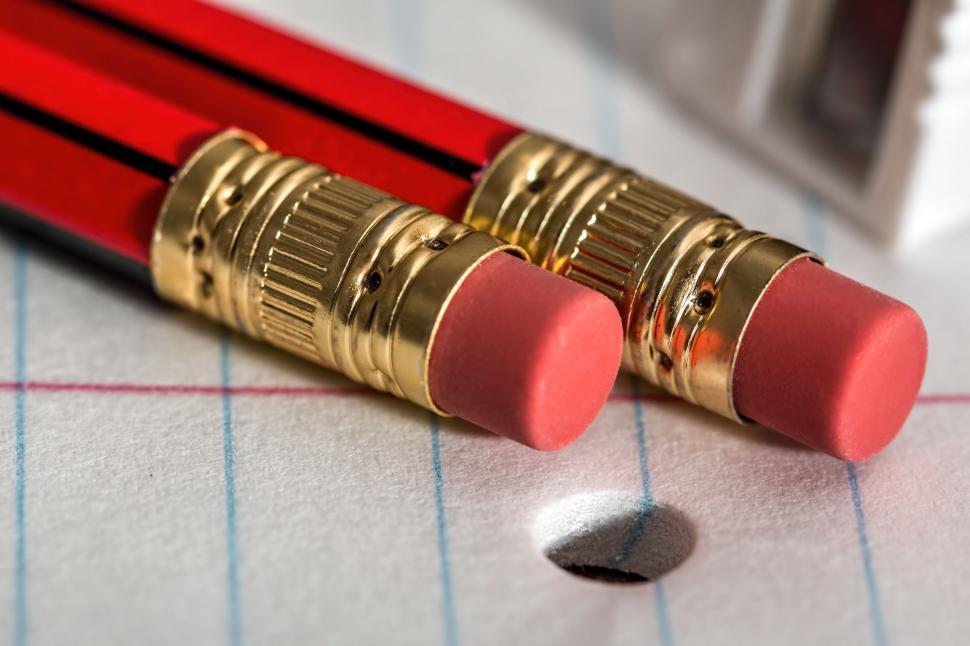 Free Image of Two Pencils on a Piece of Paper 