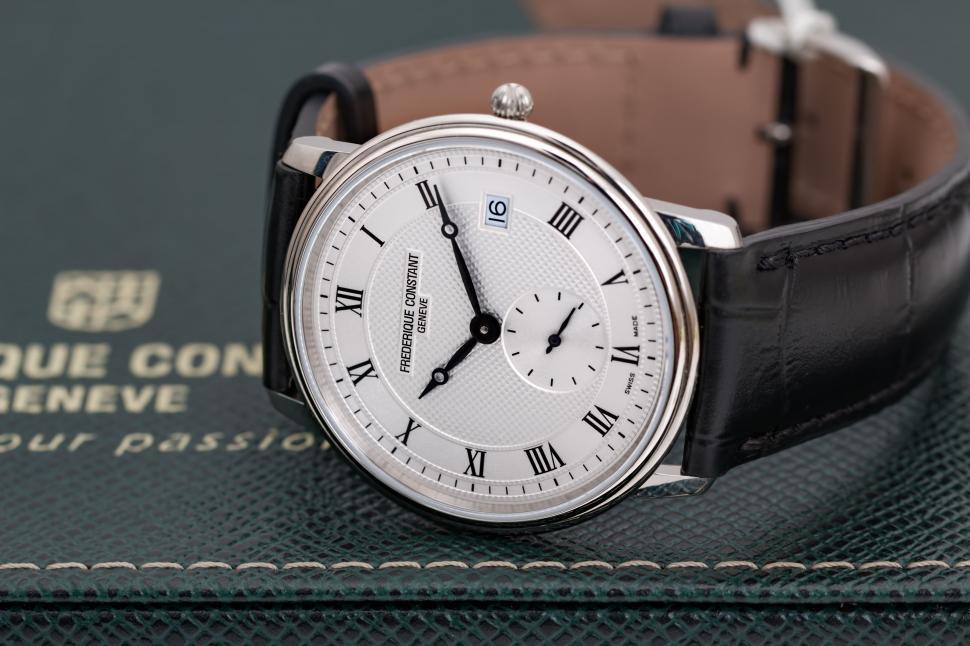 Free Image of Close Up of a Watch on a Table 