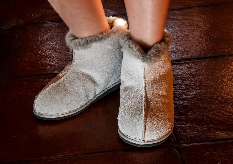 Free Image of Close Up of Persons Feet Wearing Slippers 