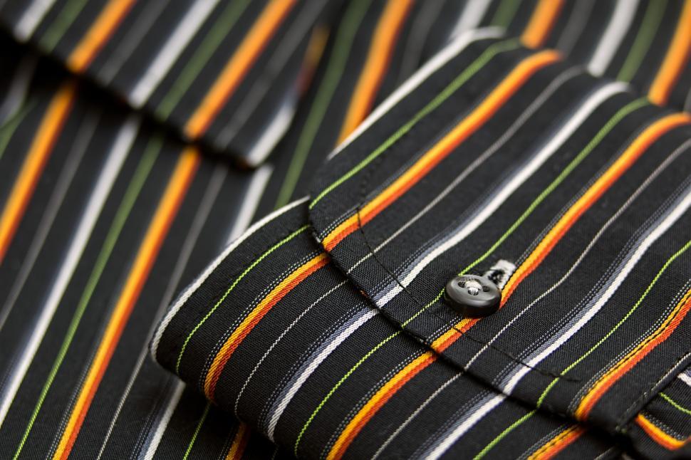 Free Image of Close Up of Striped Shirt With Button 