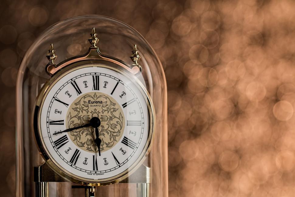 Free Image of Clock in Glass Case on Table 