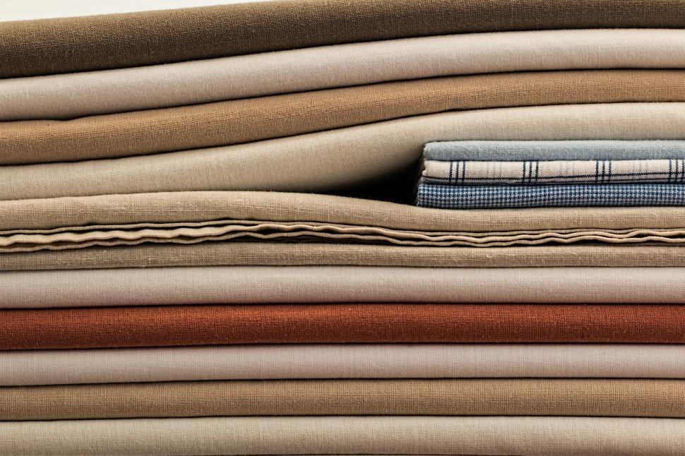 Free Image of Stacked Bed Sheets 