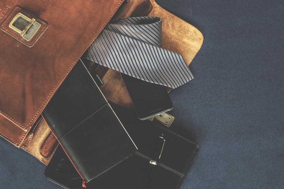 Free Image of Business Essentials Arranged on Blue Surface 