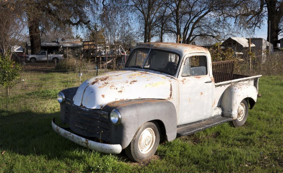 Free Image of Pick Up Truck With Dried Trees  
