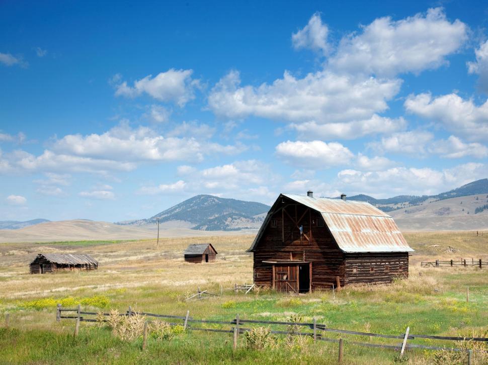 Free Image of Rolling Farm Land and Barns 