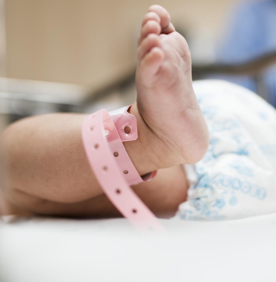 Free Image of Newborn newborn baby s foot with identification tag 