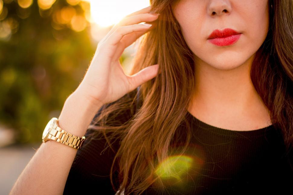 Free Image of Female Wrist Watch and Lipstick  