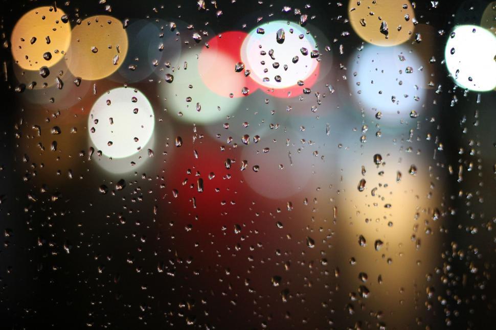 Free Image of Drops of water on glass window 